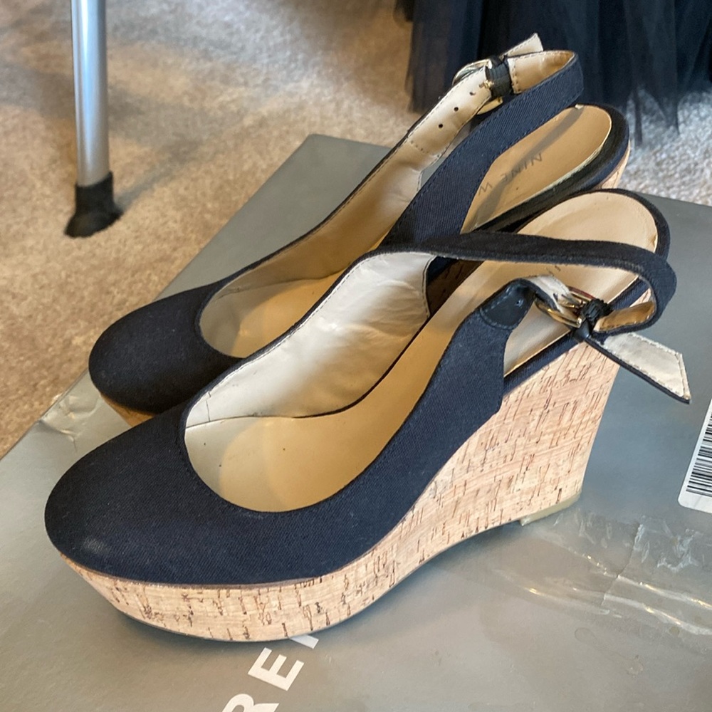Lightly worn platform heels with cork platform